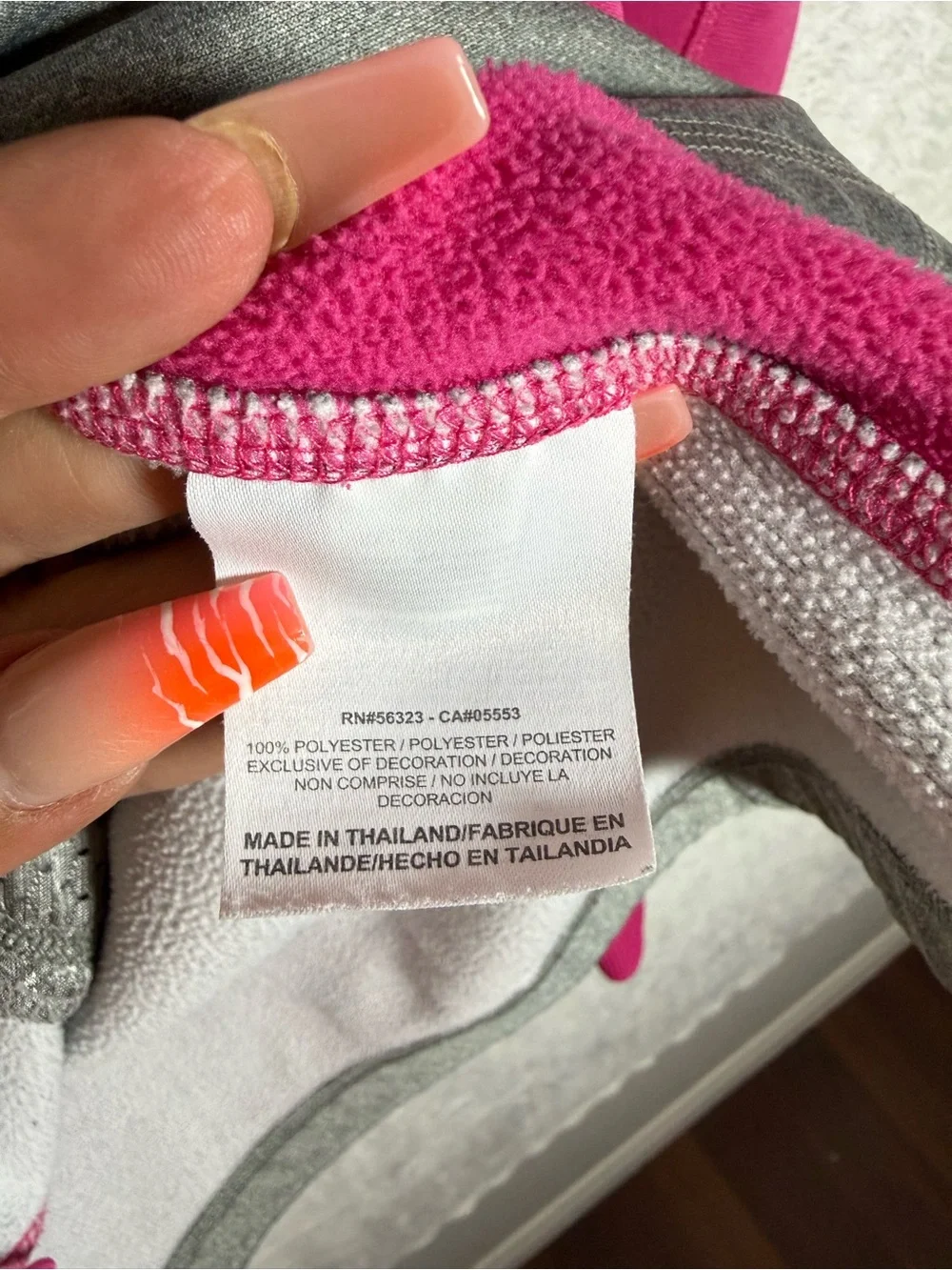 Nike Gray Body Fuchsia Pink Sleeve Hoodie. Be seen in this one 🤩😎